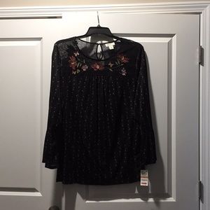Black shirt with flowers